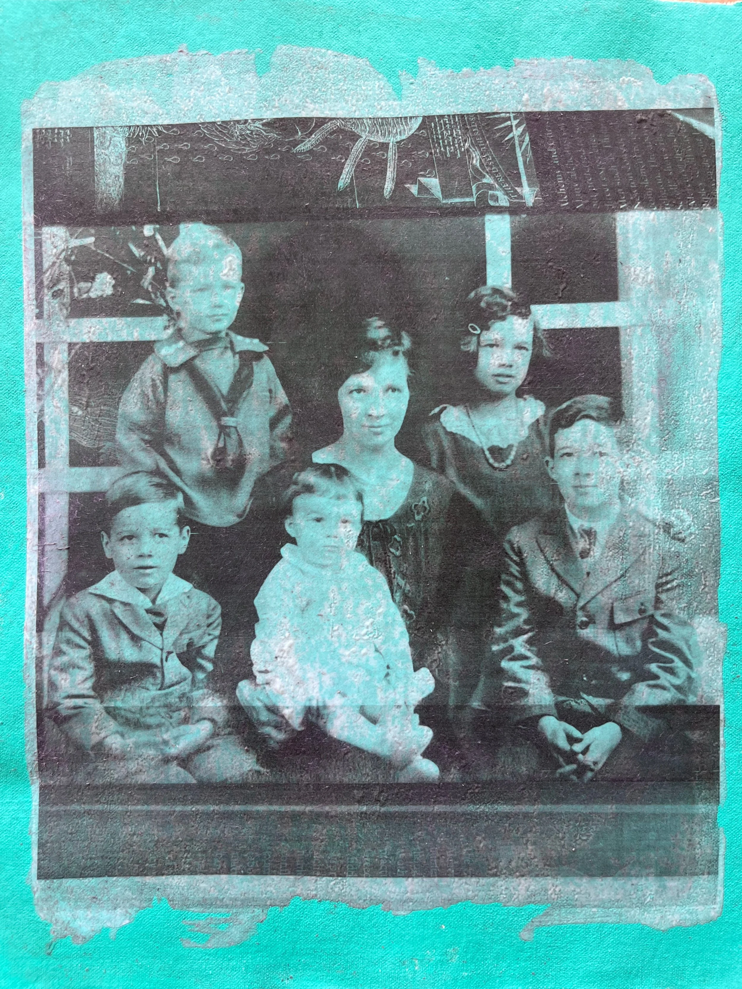 Portrait of family in dress clothes on a green background