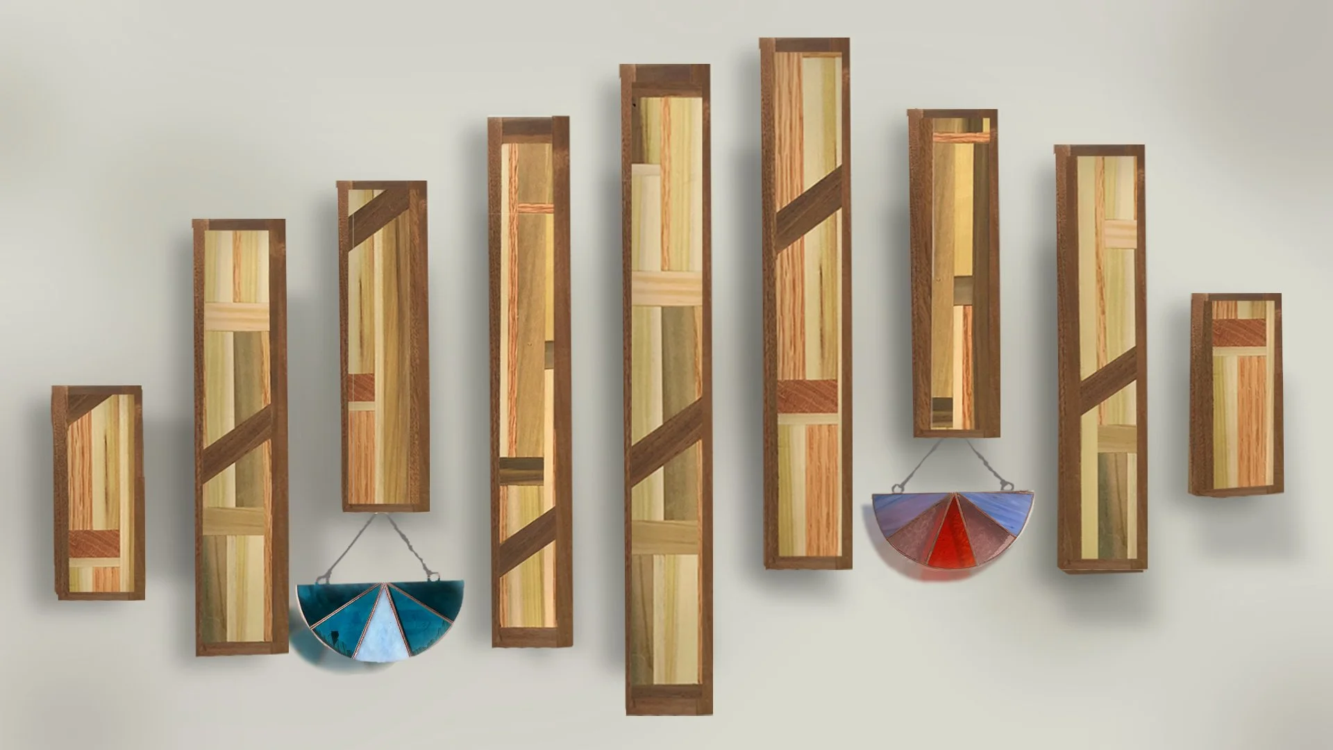 Wood and stained glass sculpture hanging on wall