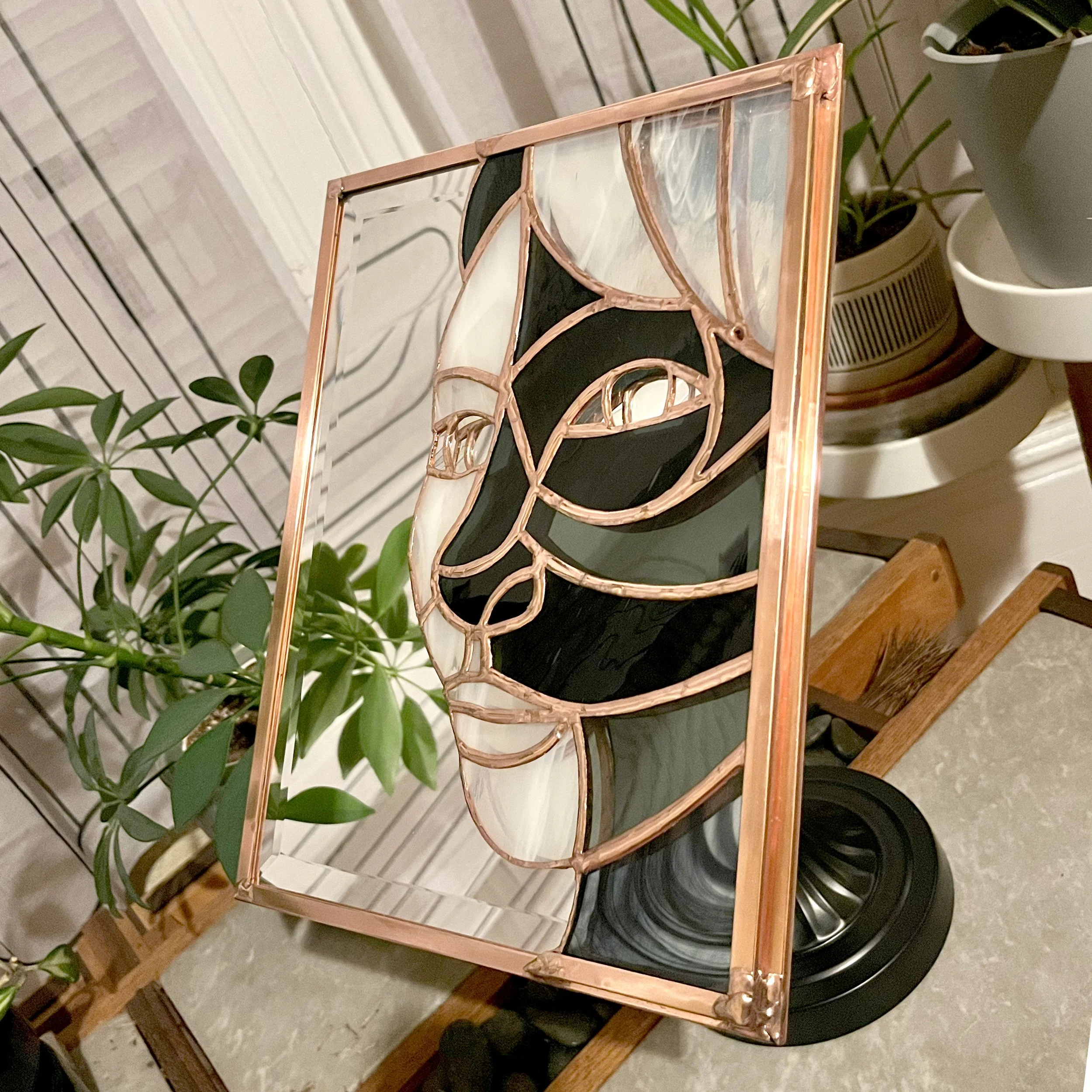 Stained glass portrait mounted on mirror
