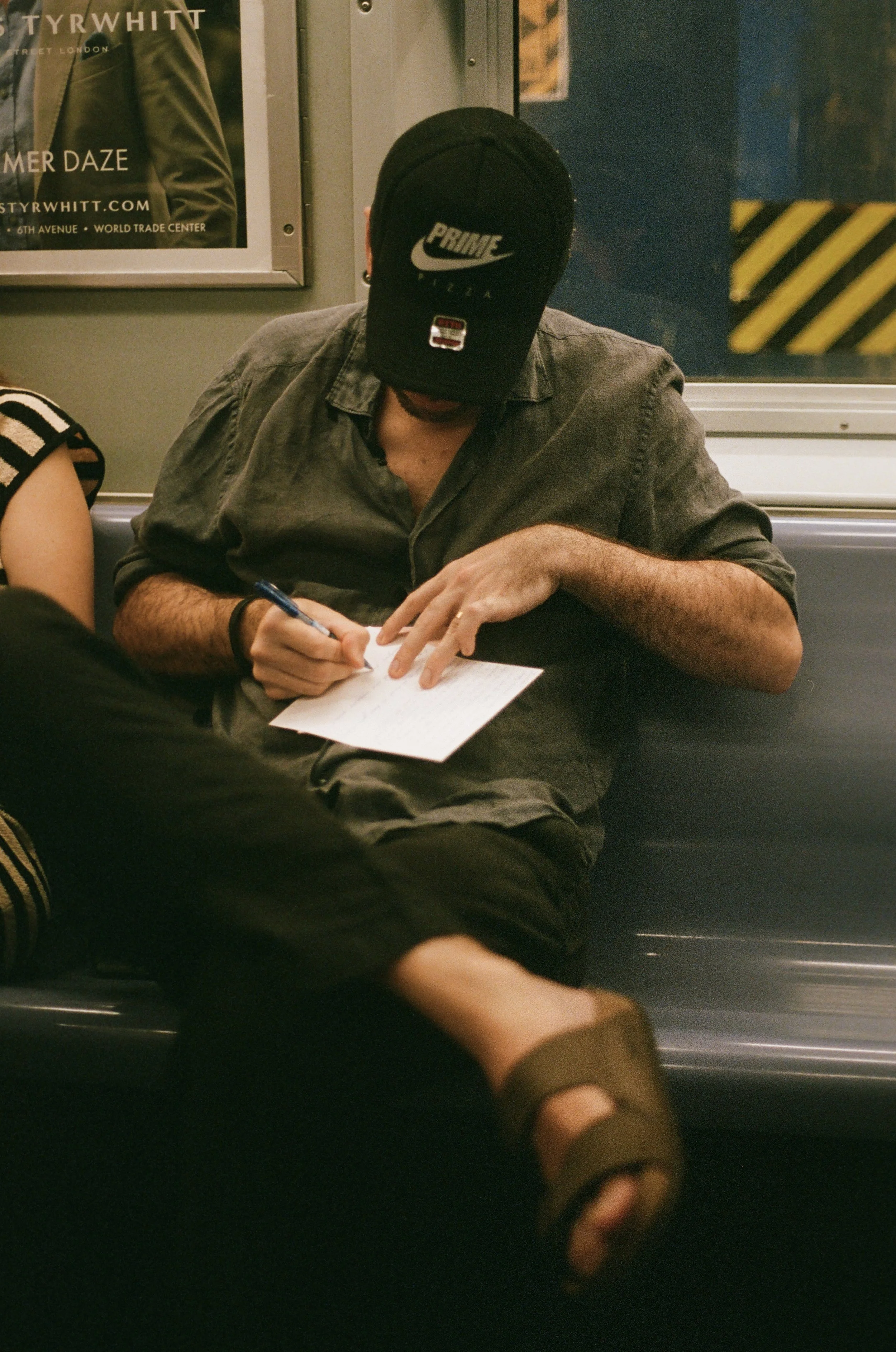 Handwritten Card on the Subway; New York City; 35mm Film; 2024