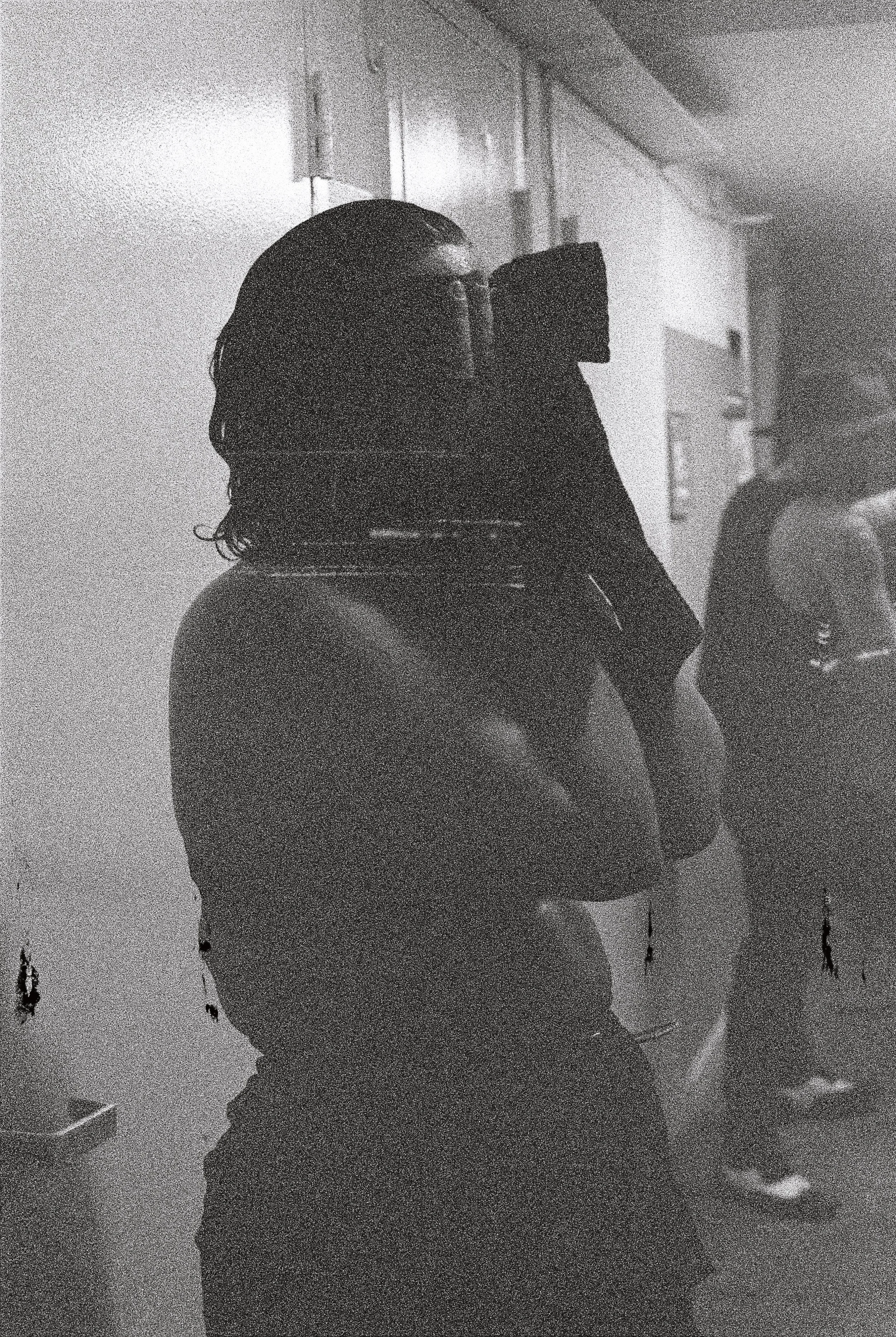 Sammy Rae of Sammy Rae & the Friends right after performing on stage wiping down after dunking her head in water backstage. 