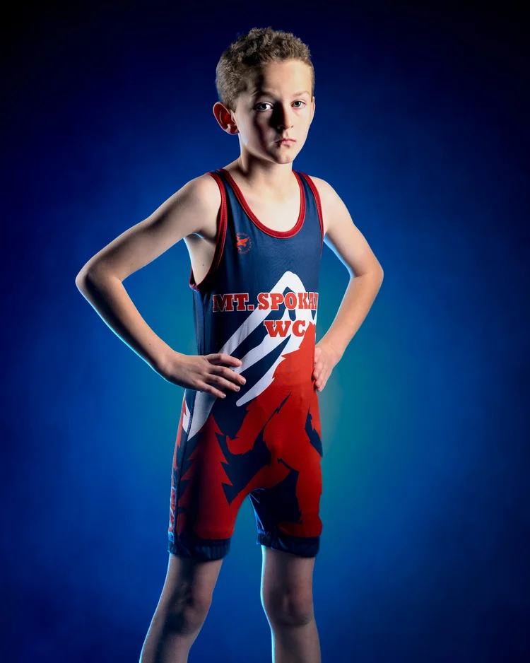 Athlete hero shot with dramatic studio lighting