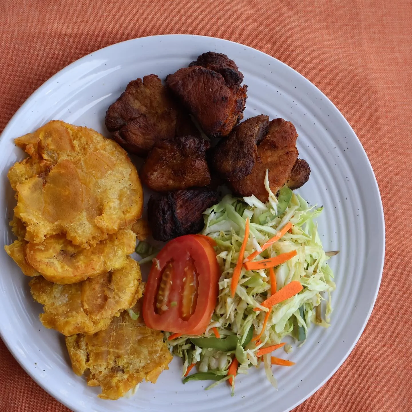 Fried plantains, griyo, and pikliz &mdash; made by Maritza. Book her now at the link in bio!