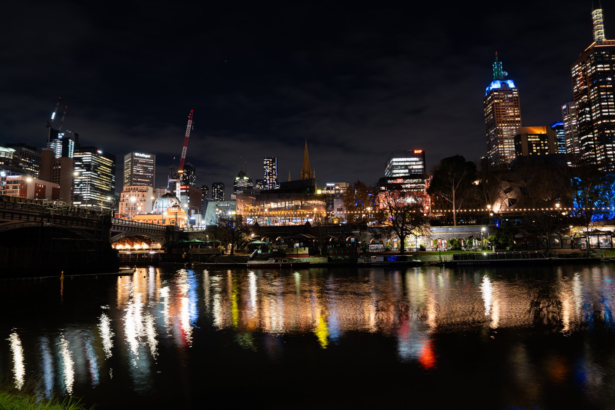 Melbourne city lights reflecting on Yarra River water
