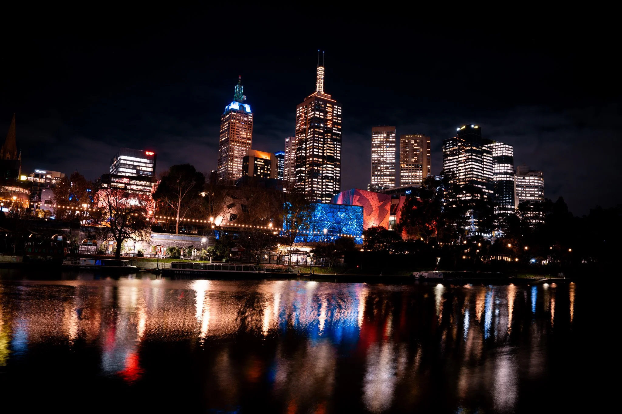 Melbourne Federation Square light reflecting on Yarra River water
