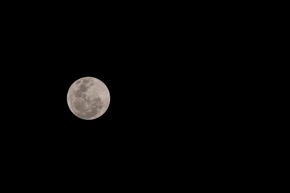 Full moon at night above St Patrick Cathedral