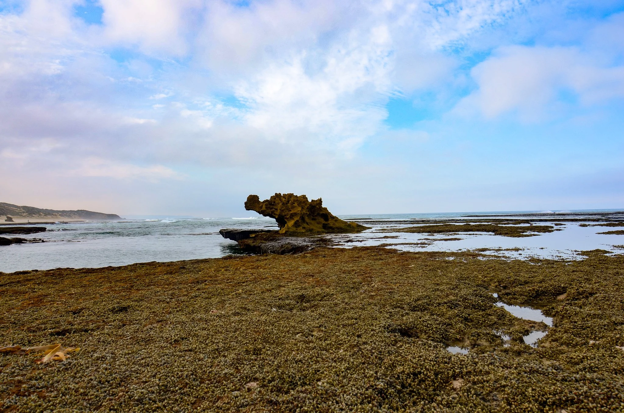 The side of the Dragon Head Rock at Number 16 Beach
