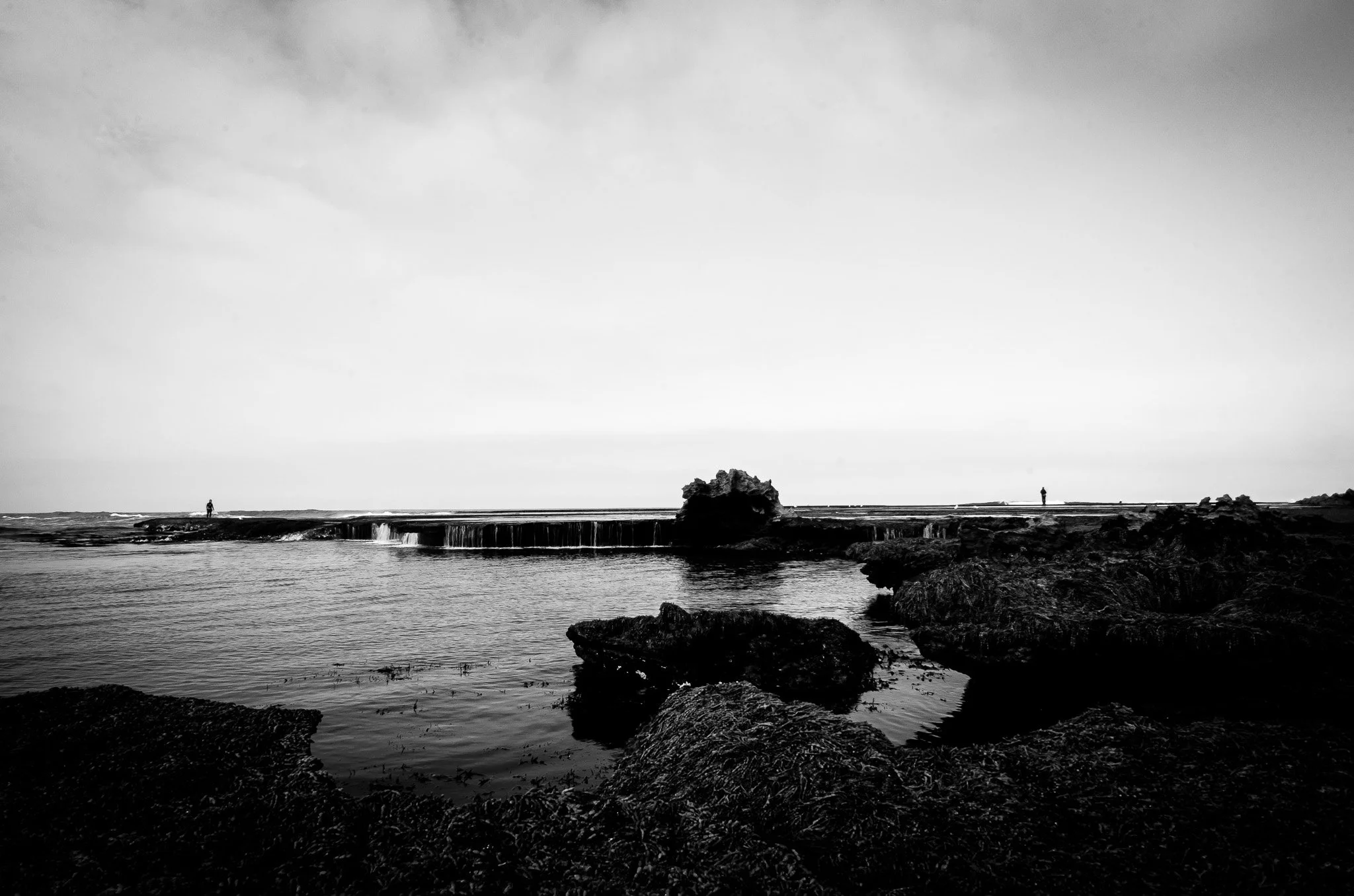 Black & White photo of the Dragon Head Rock at Number 16 Beach