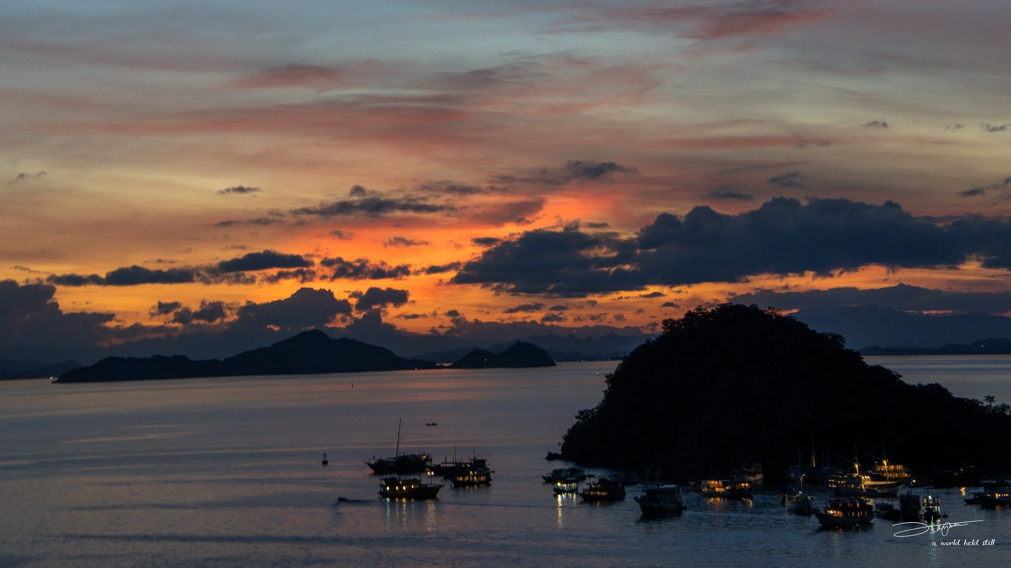 Sunset at Labuan Bajo, Indonesia | Boats Anchored by the Island