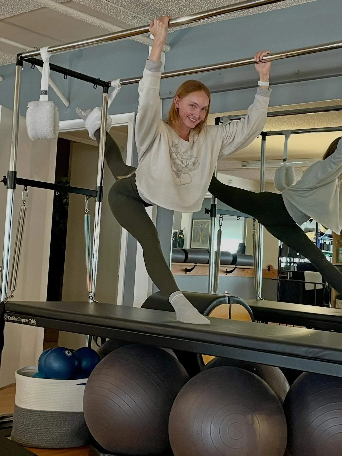 Ever wondered what those fuzzy things hanging off the Cadillac are? Wonder no more!

This is just one of many examples of how to utilize the fuzzy straps to enhance your pilates experience! Yes, the stretch feels as good as it looks!!

Pilates-4-Virg