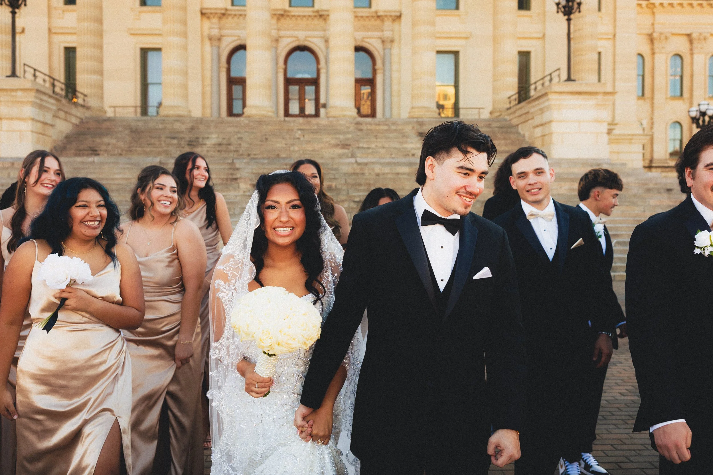 Couple kisses after getting married at Event Venue The Beacon. Captured in Topeka, Kansas by RAW Shutter Photography. 