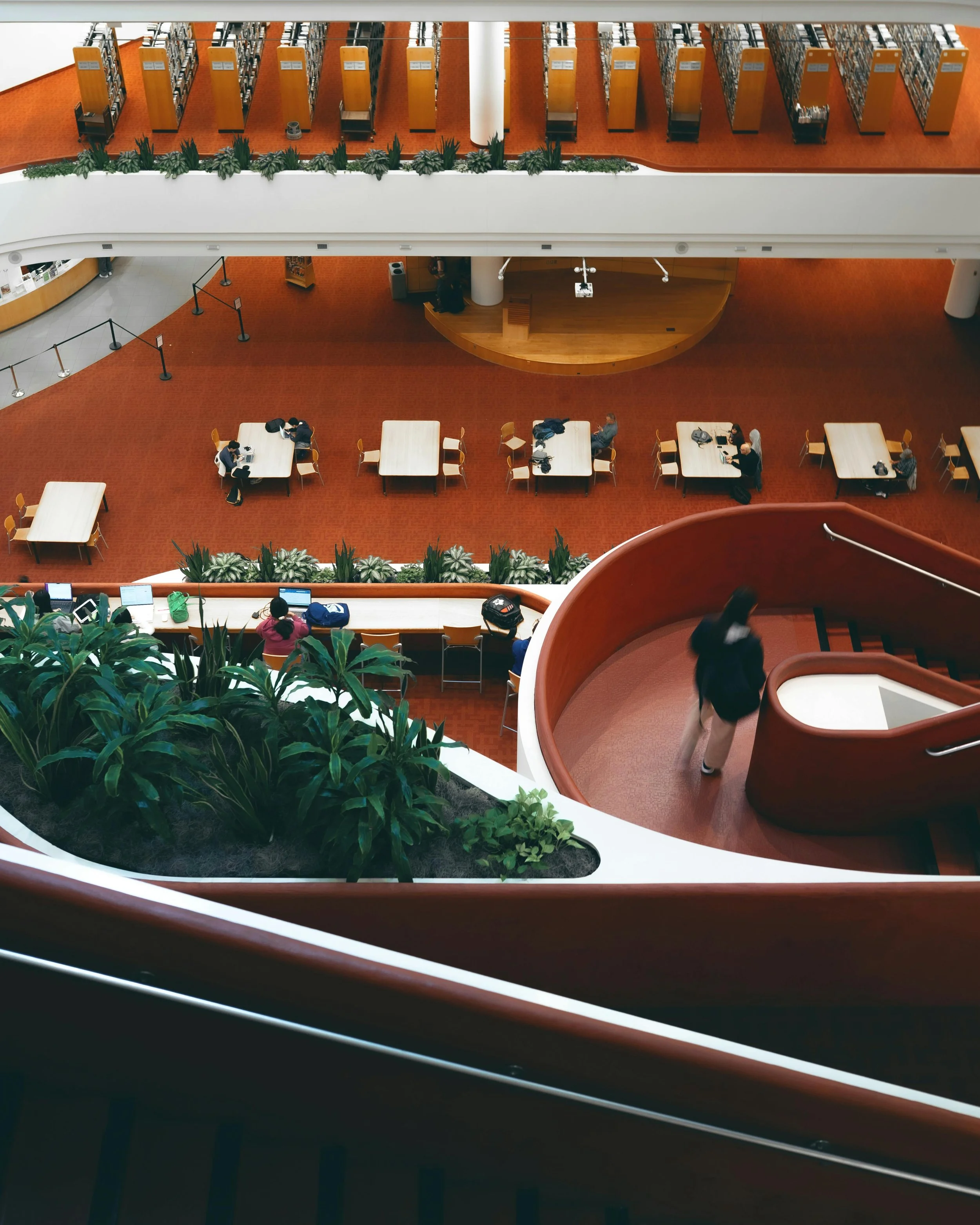 An interior photo of the Toronto Reference Library shot by Arvind Krishnan that showcases the unique architectural design of the space for Public/Realm's tastemaker series blog post