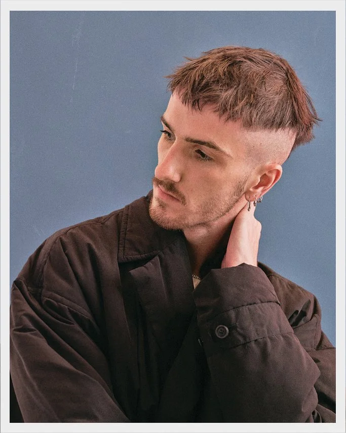 An artistic headshot of Kirk Lisaj shot by photographer Claudine Baltazar as featured in Public/Realm's tastemaker blog post series