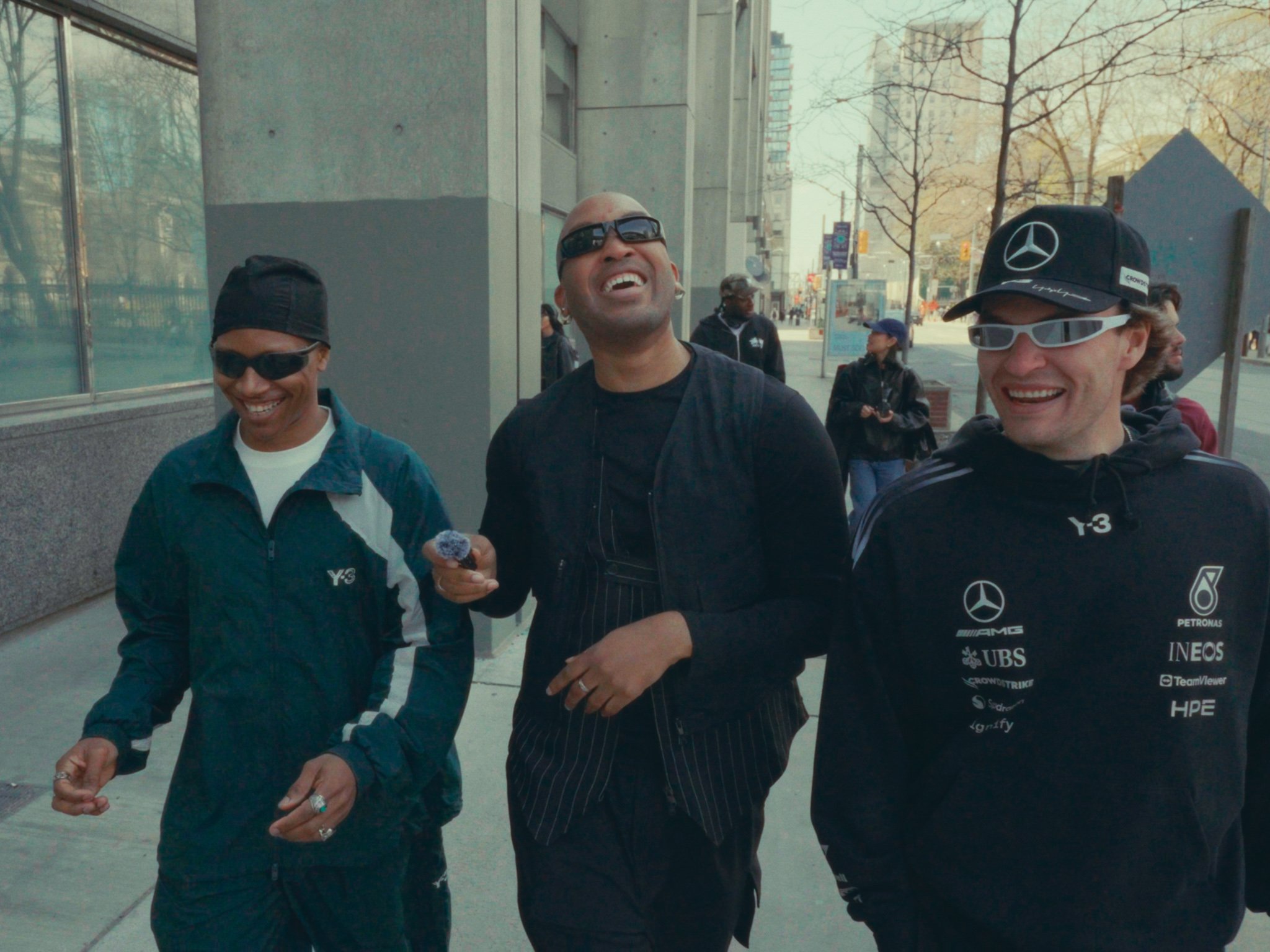 Behind-the-scenes footage of three Y-3 tastemakers walking down the street during the fashion film shoot.