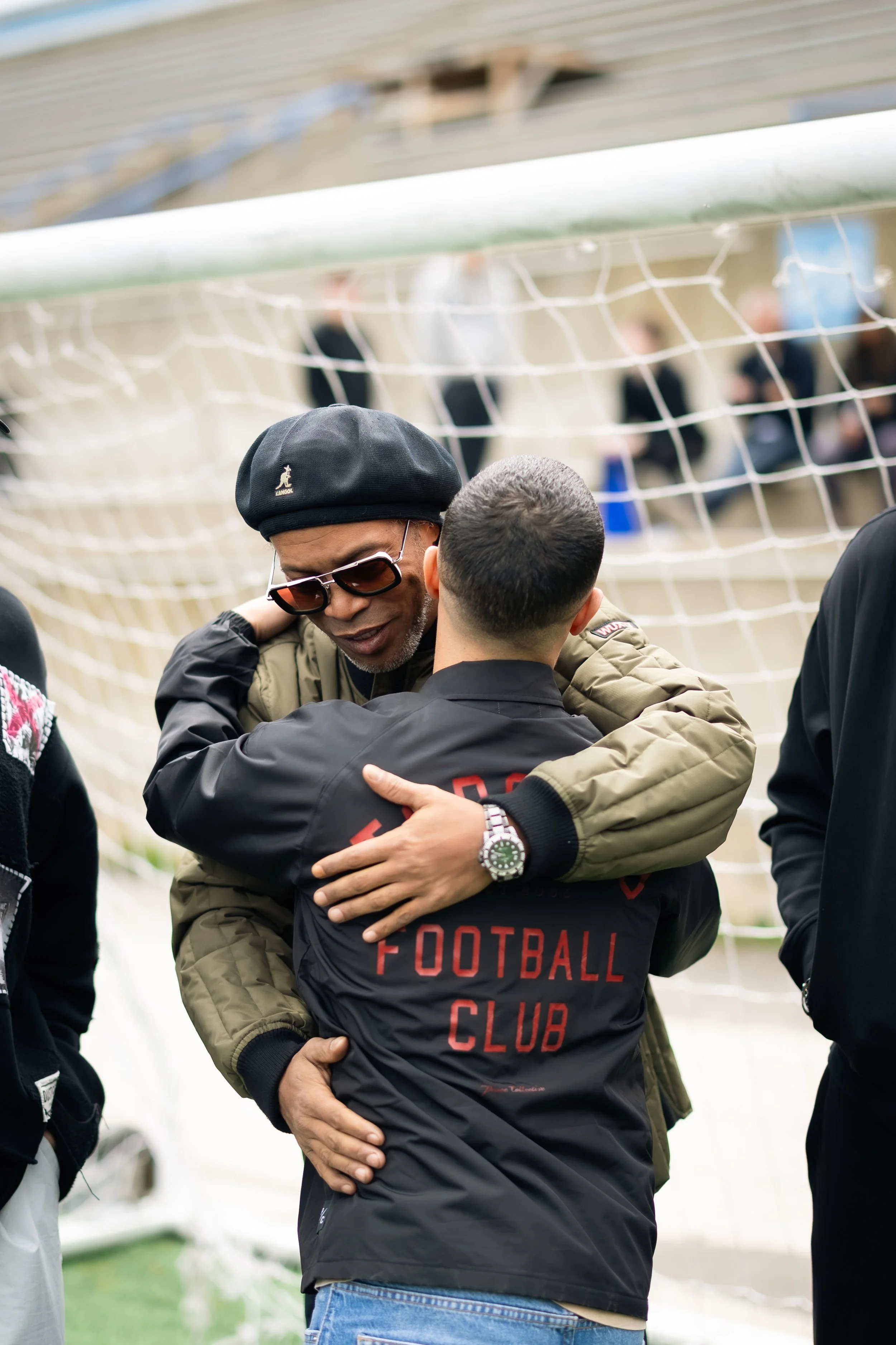 Soccer legend, Ronaldinho hugs TFC alum Seba Giovinco at a PR media event ahead of the Living Legends soccer match on May 8