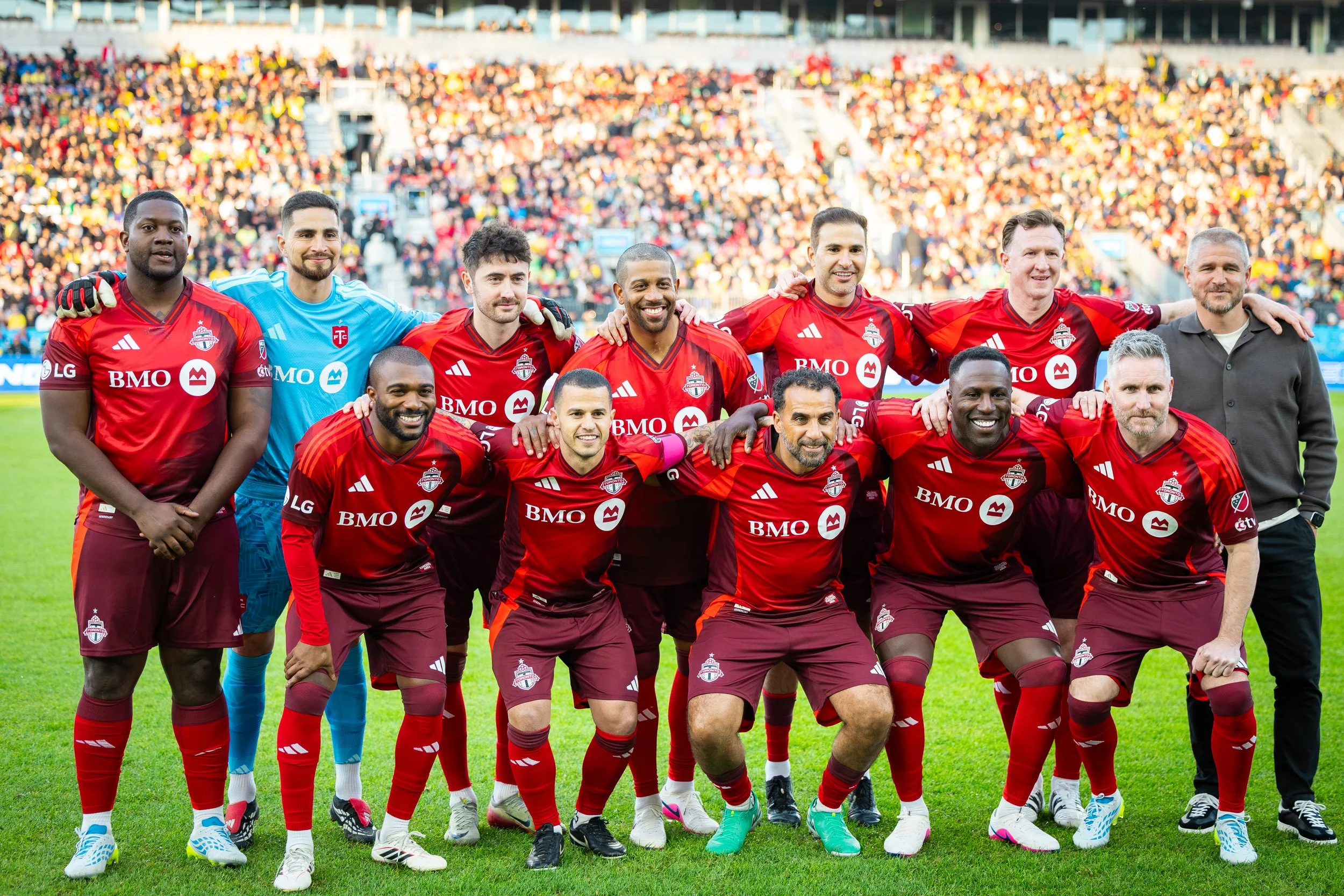 The TFC legends lined up at the Living Legends soccer match on May 8