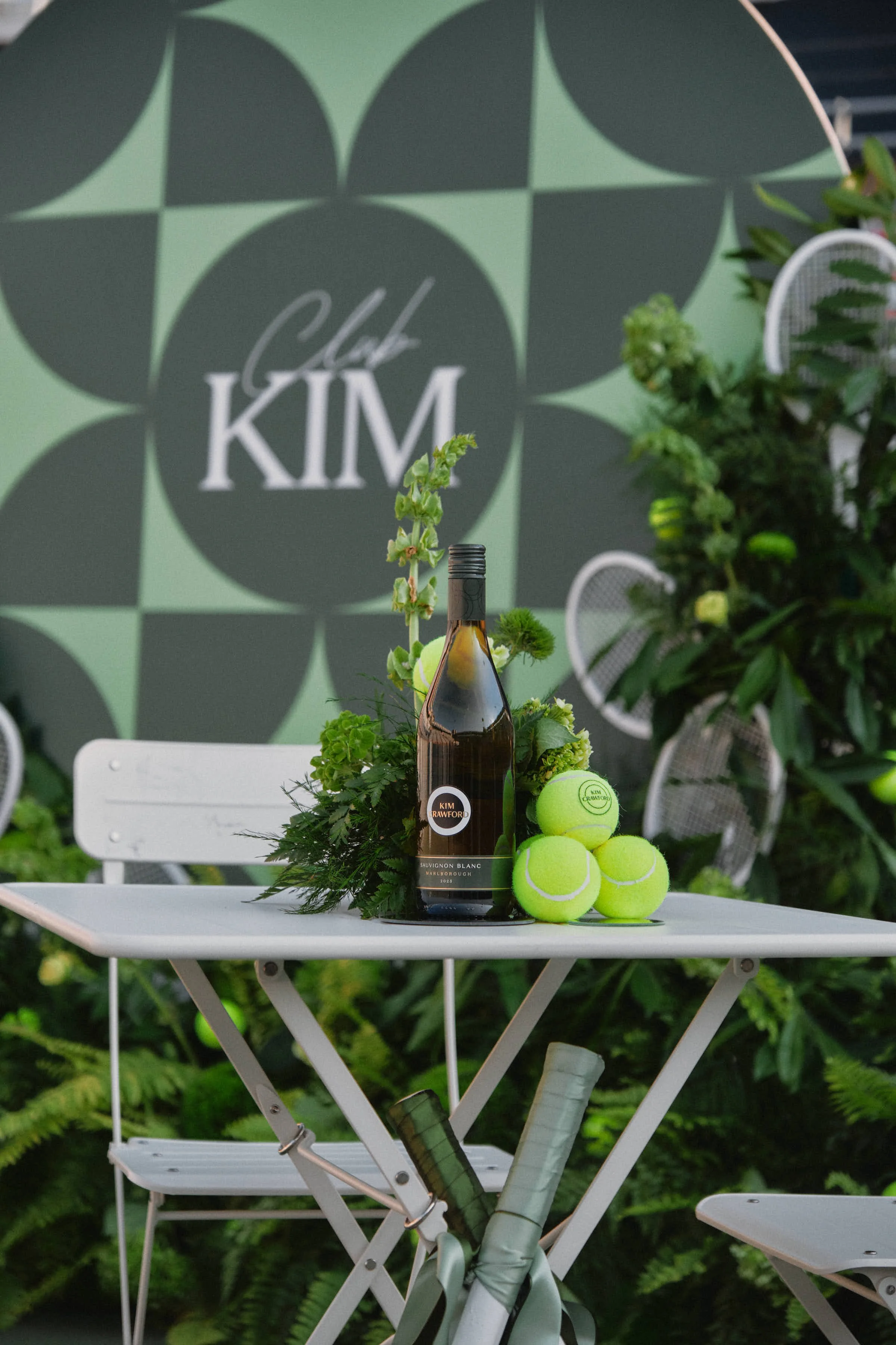 Kim Crawford tennis-inspired photo opp and bottle display at the golden hour event on Centre Court.
