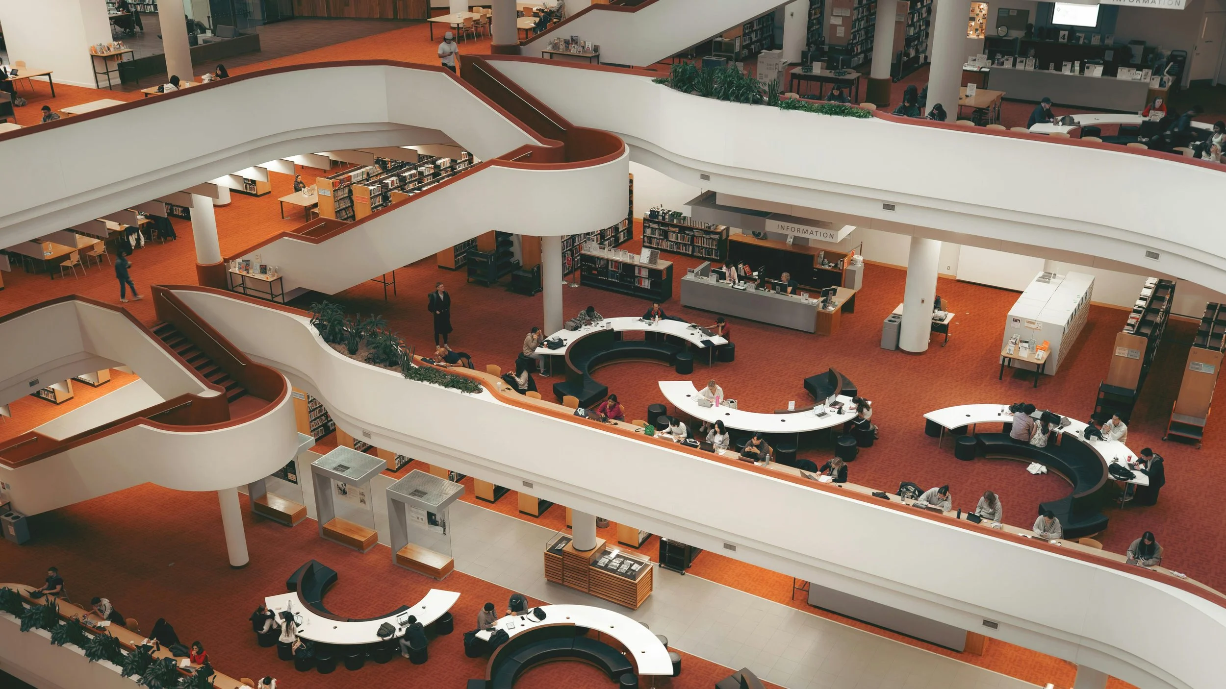 An interior photo of the Toronto Reference Library shot by Arvind Krishnan that showcases the unique architectural design of the space for Public/Realm's tastemaker series blog post