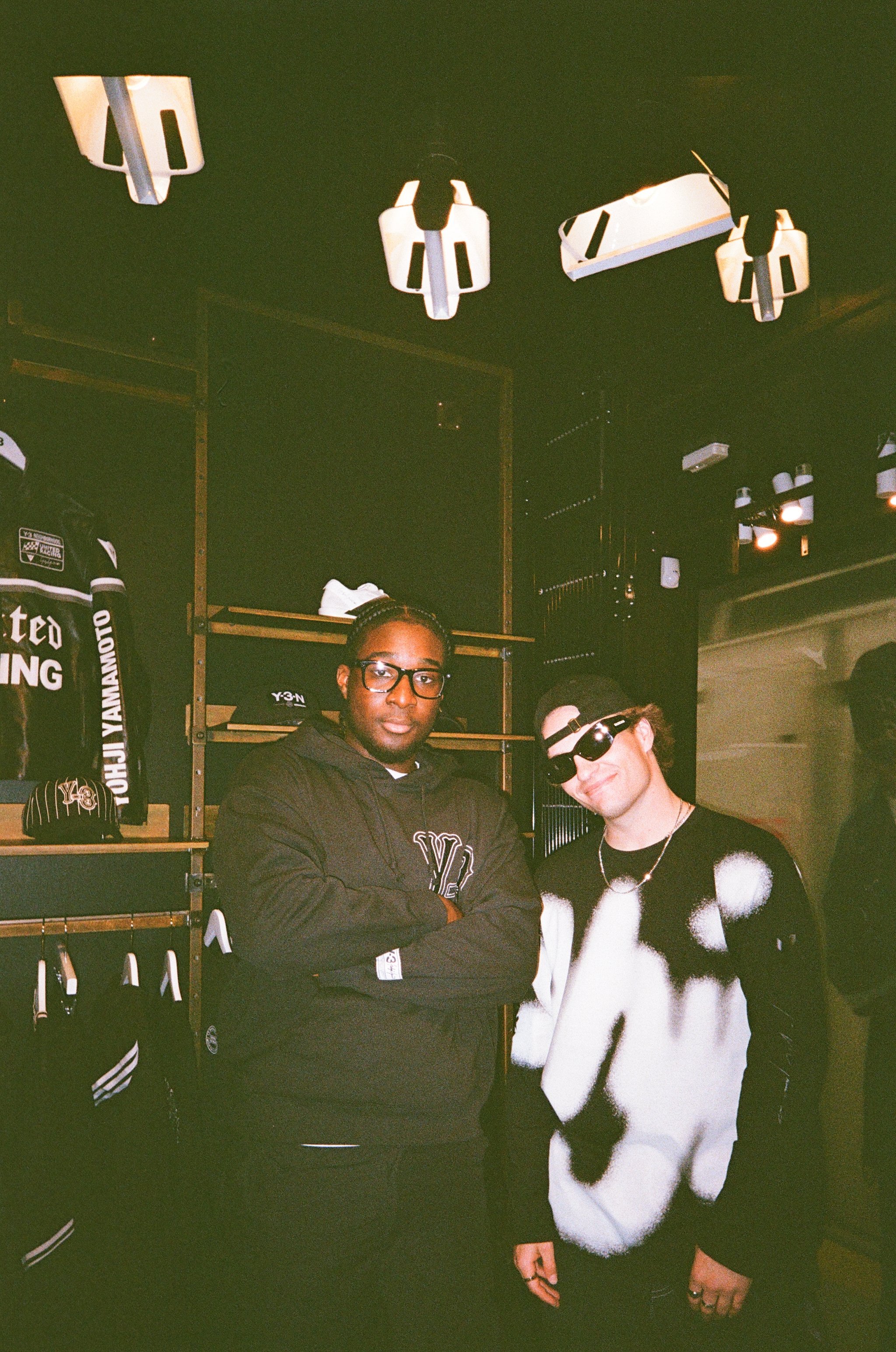 Filmmaker Hansel Ako and tastemaker and professional skateboarder, Cody French pose together at the Adidas Y-3 event.