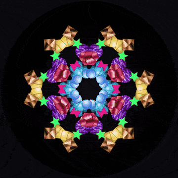 Kaleidron's mirrored barrel turning, jewels tumbling into symmetry