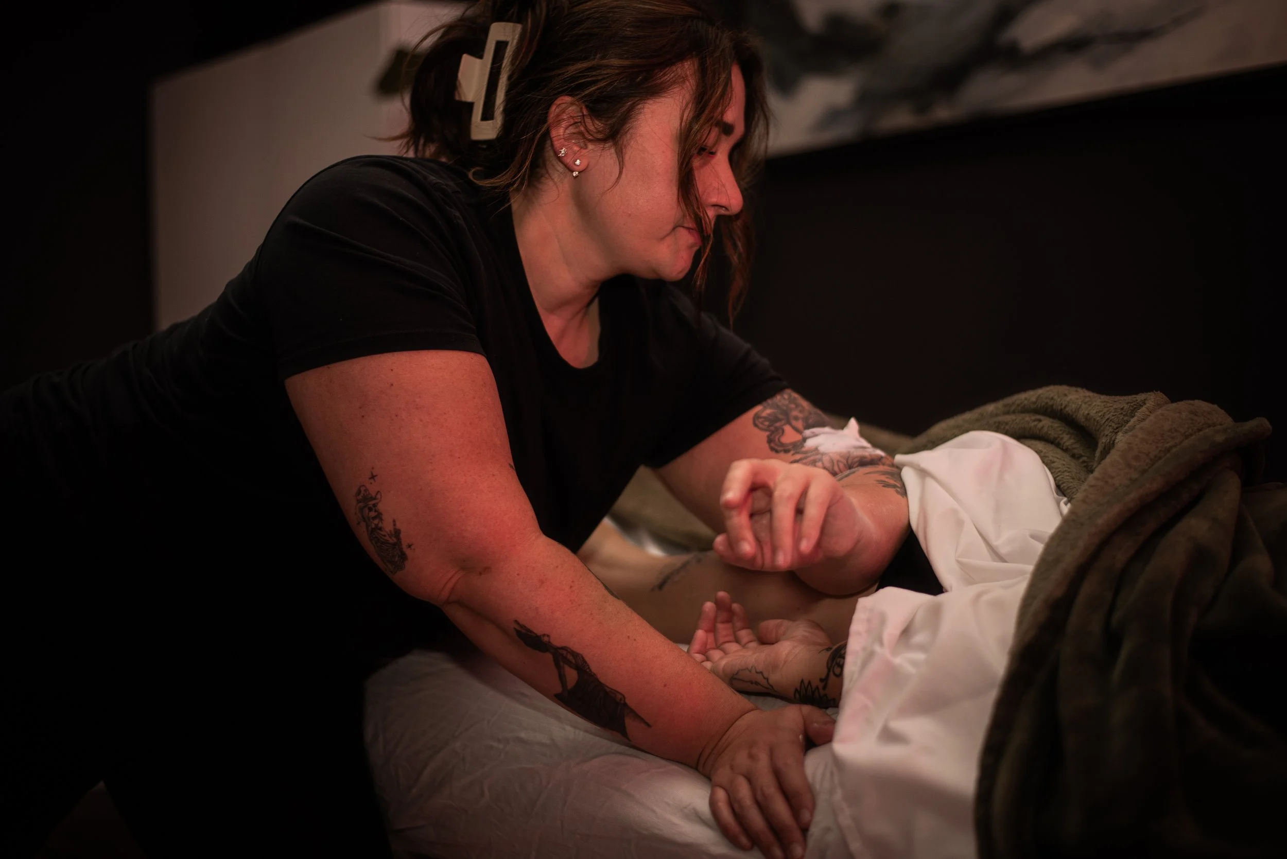 Massage using elbows.