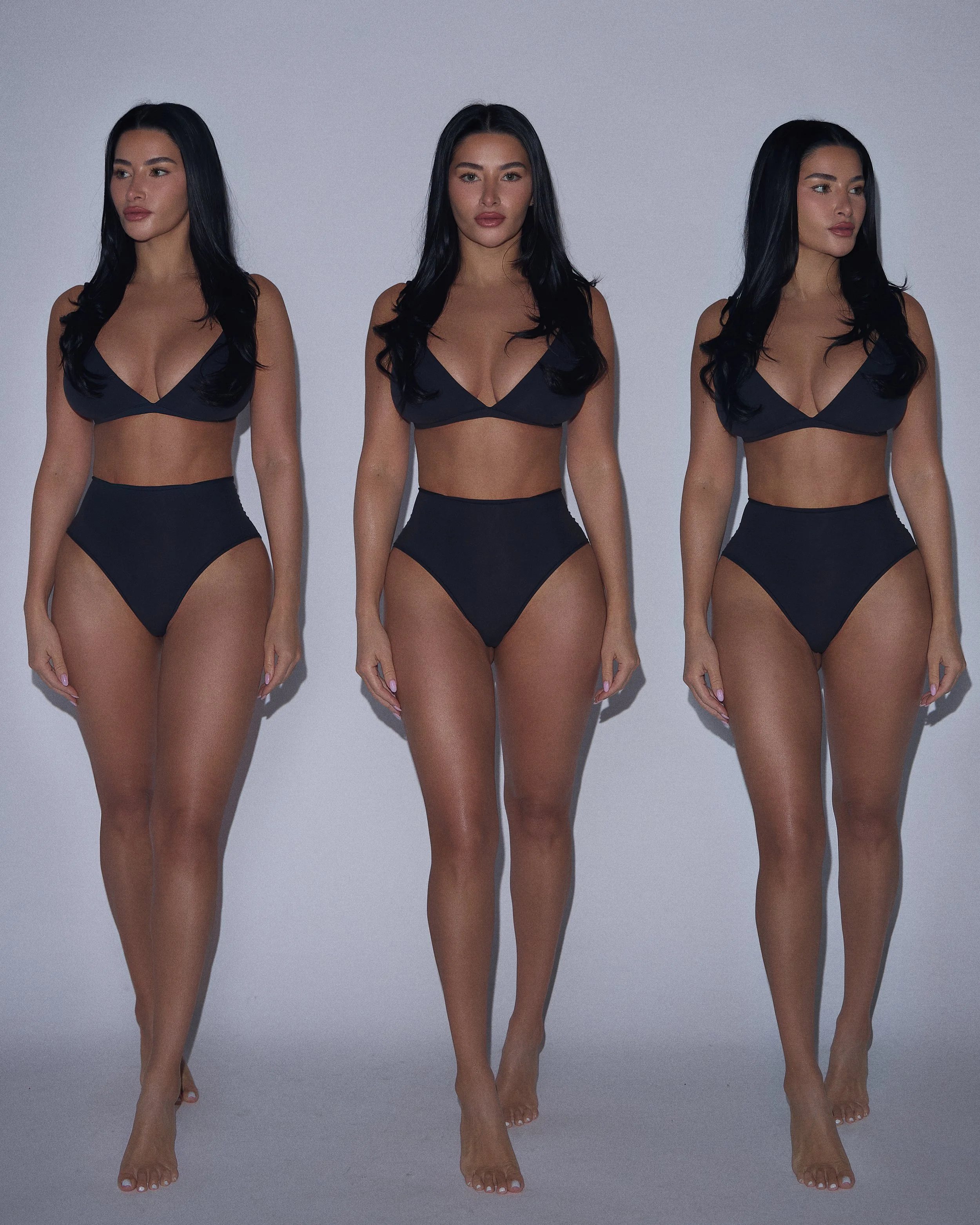 Lingerie photography in Los Angeles: three models in black two-piece sets on a gray studio backdrop, by Moises Martinez