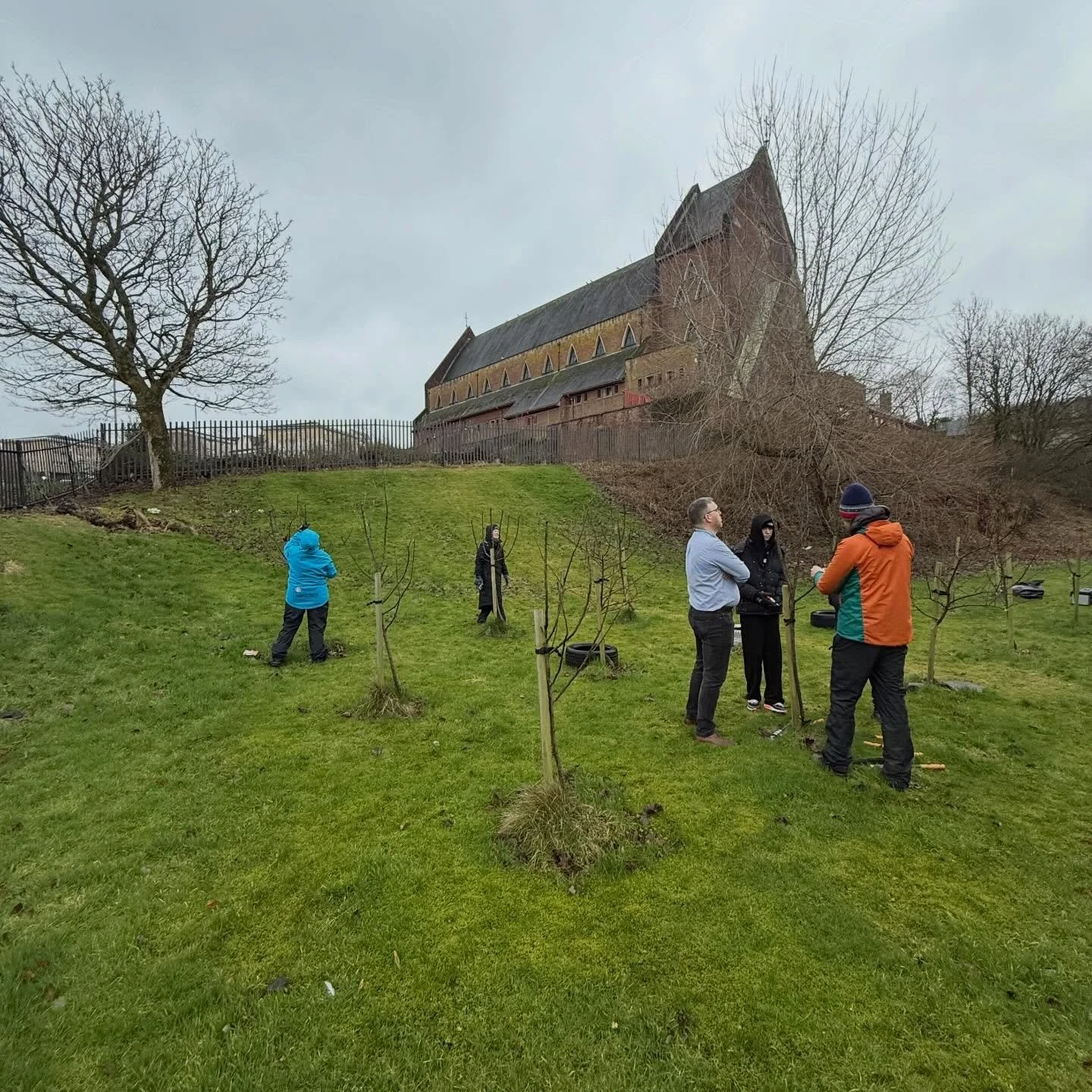 We were up at the St Laurence RC &amp; Lomond View Academy Orchard&rsquo;s today doing winter pruning with Fergus Walker from @theorchardproject - these orchards have an amazing setting within the grounds of the Grade A Listed church and on the histo
