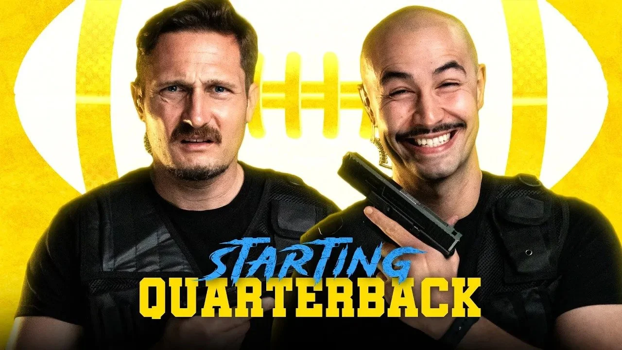 Two men with expressive facial expressions, one looking confused and the other smiling while holding a handgun, standing in front of a yellow background with a football graphic. The text on the image reads "Starting Quarterback."