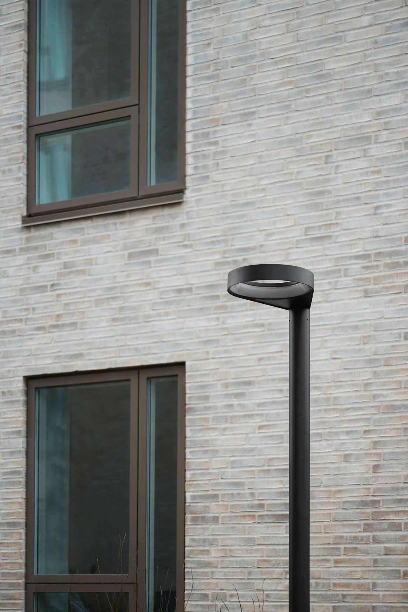 Parking Lamp Otto L1700 designed for Lampas in front of a Scandinavian residential area