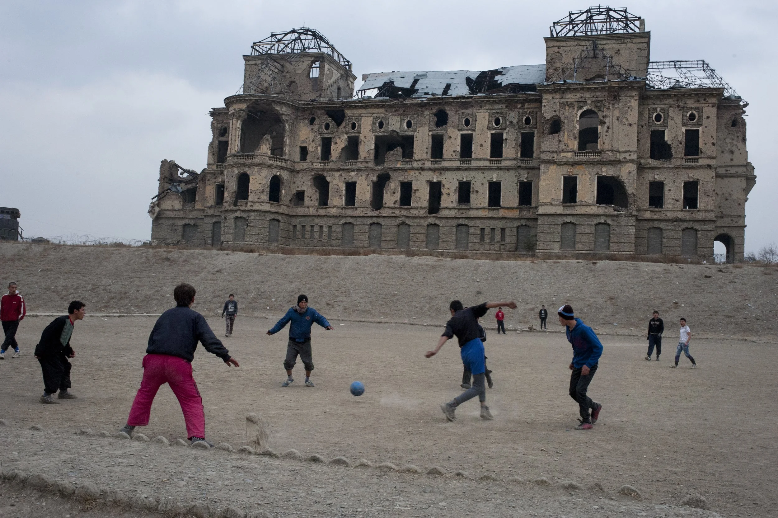 Match at the Shah, Kabul 2012 The kids from Hazara neighborhood play football in front of the Palace of the Shah. Life goes on despite the continuing war.