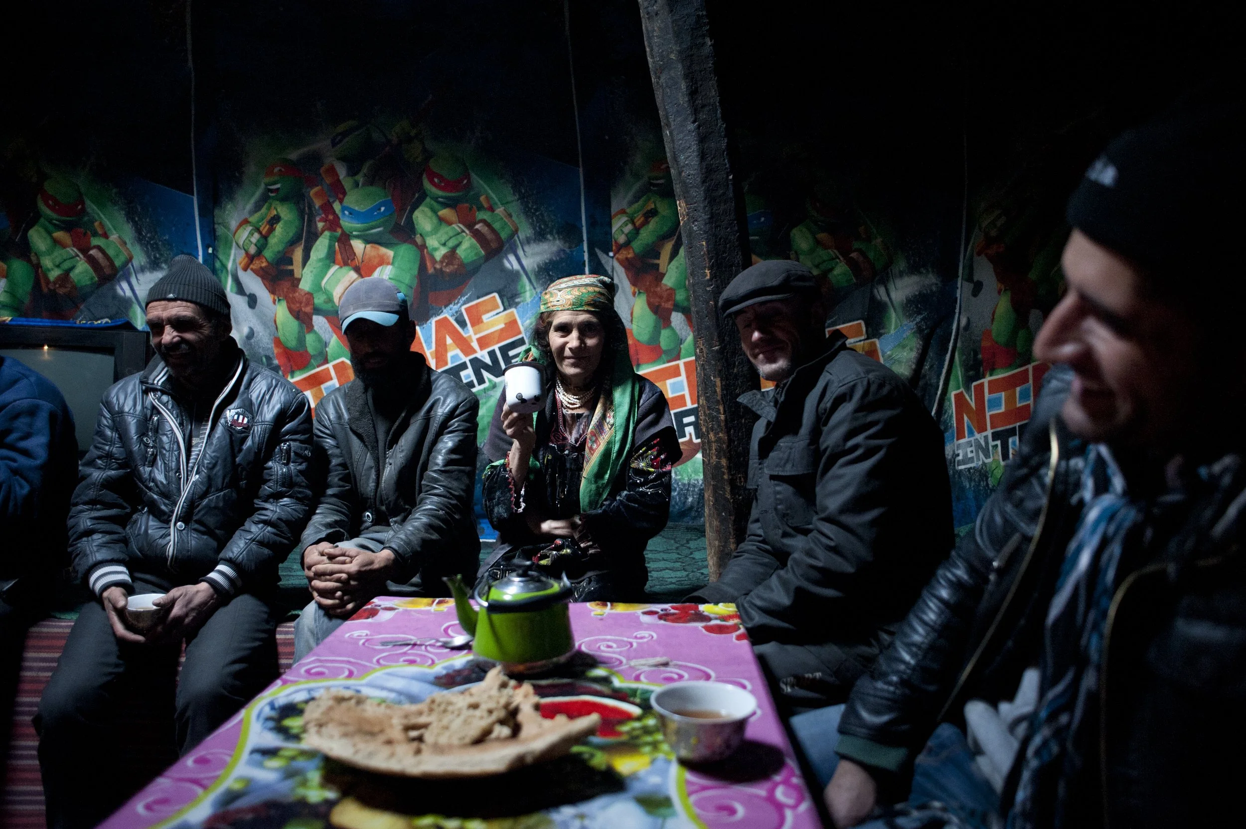 Lunch time at Odninamo’s. All the neighbors come over for cup of tea. Men enter, they take a cup off the shelf, pour salty tea and sit down at the table. The Pamiri are well known for their endless hospitality. Here you may enter a house without knoc