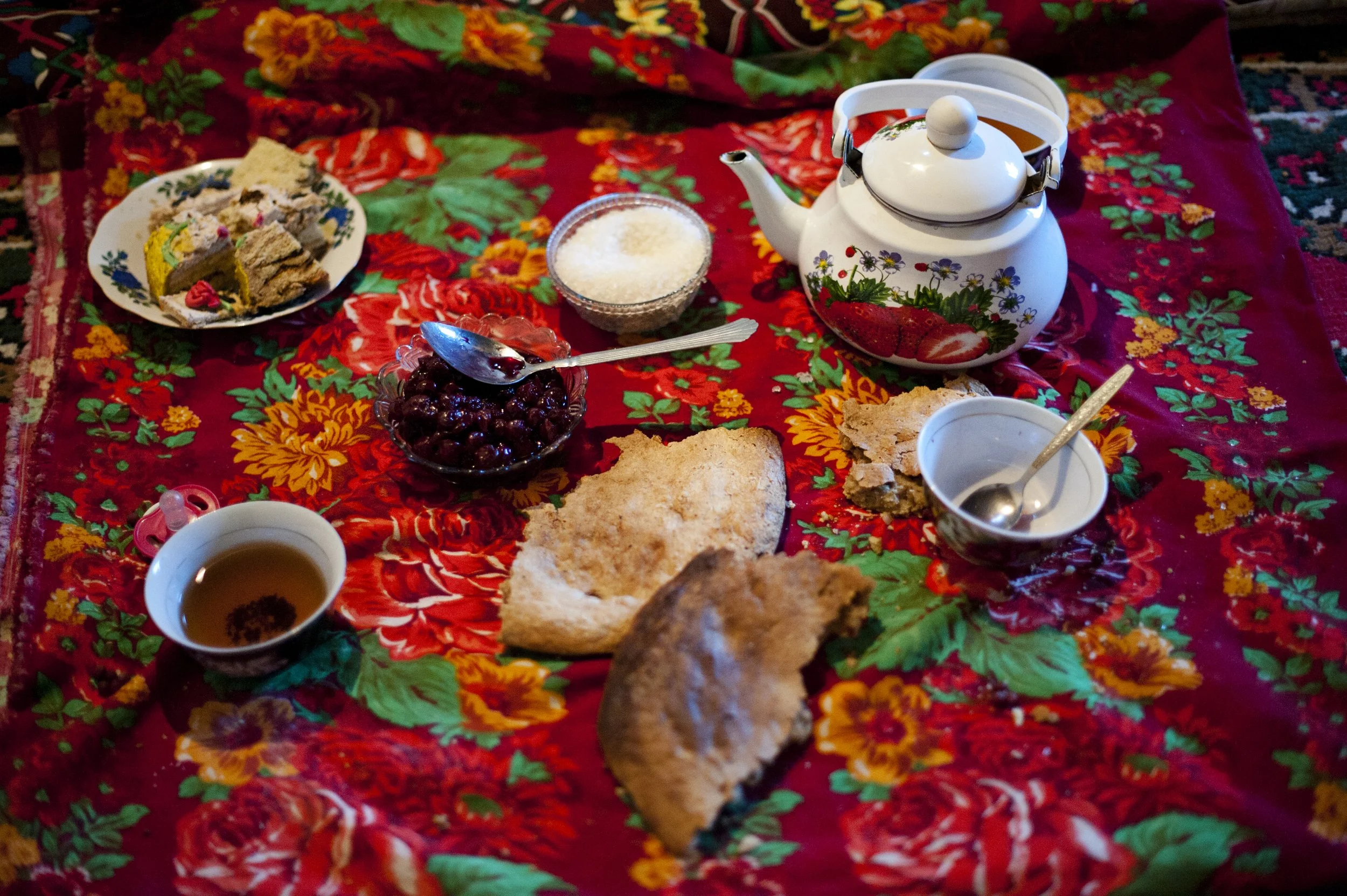 Afternoon tea at Johonoro’s whilst spending the summer at her family house in Roshorv. In winter, she goes down the valley to her husband's village, where cherry jam and nuts are produced. Here in Roshorv is too cold to cultivate them. According to t