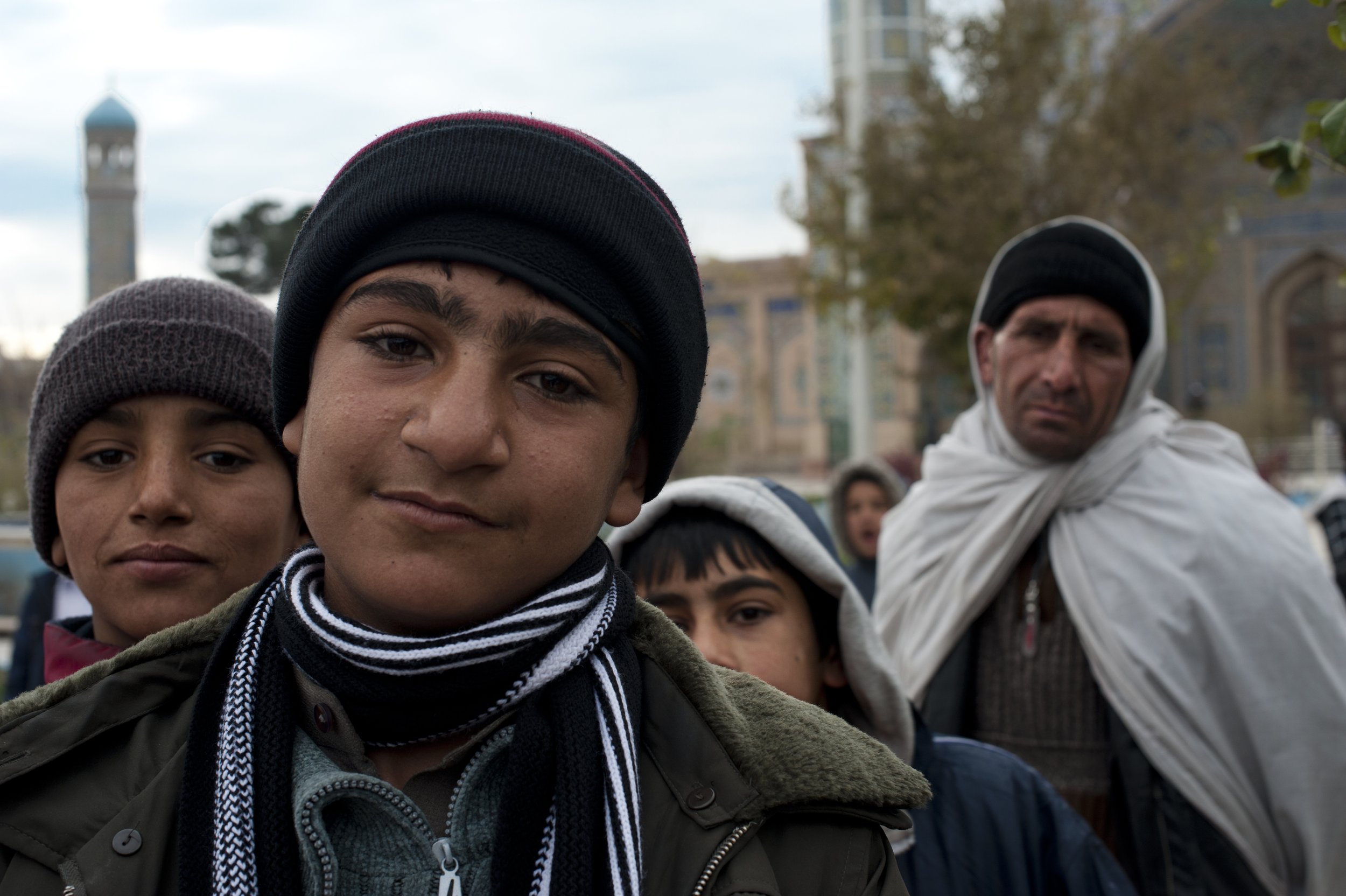 Young Heratis, Herat 2012 Boys in front of the Blue Mosque. These boys work as a shoe cleaners sell socks.