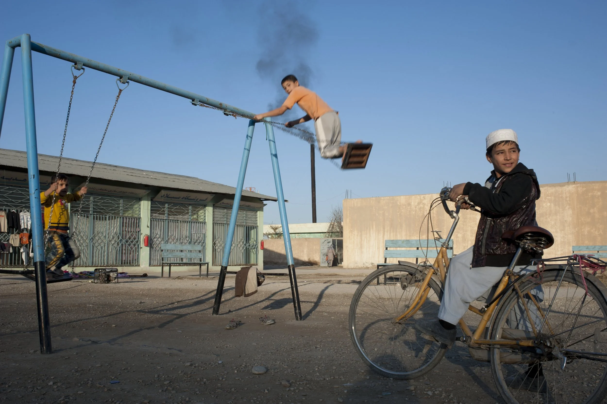Playground at a “women’s bazaar", Mazar-i-Sharif 2012. Children play at a playground of women’s bazaar, a place established by a German NGO is meant only for women and children. Men do not have the right to enter, unless accompanied by woman. In this