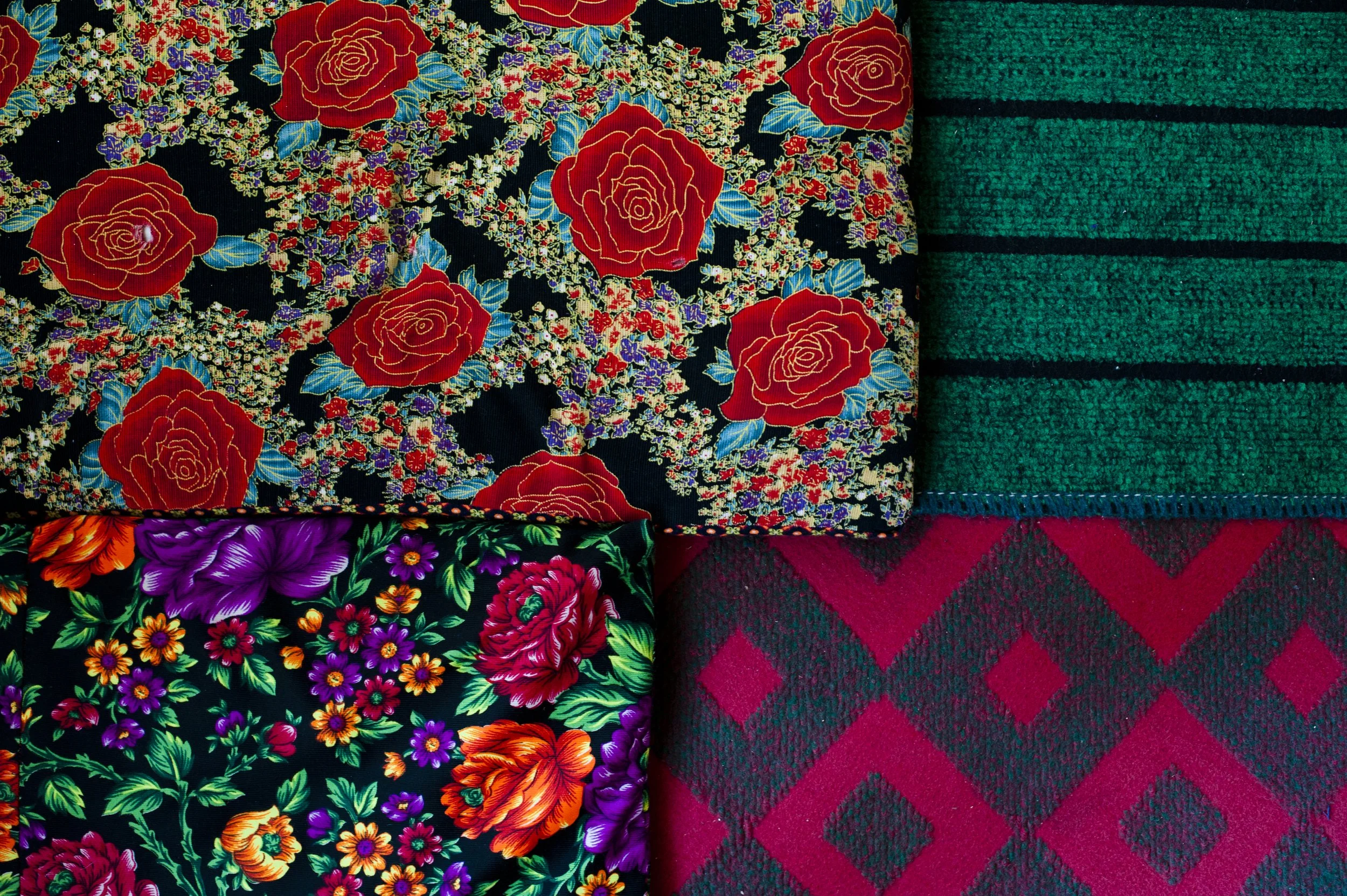 Colorful mattresses are used as seats during the day and are slept upon at night.