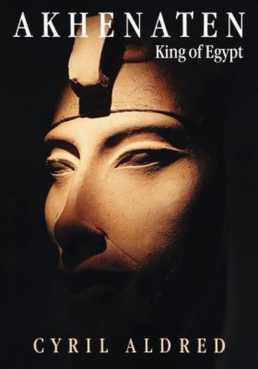Book cover titled 'Akhennet: King of Egypt' by Cyril Aldred, featuring a close-up of an ancient Egyptian sculpture with detailed face and headdress seen partially.