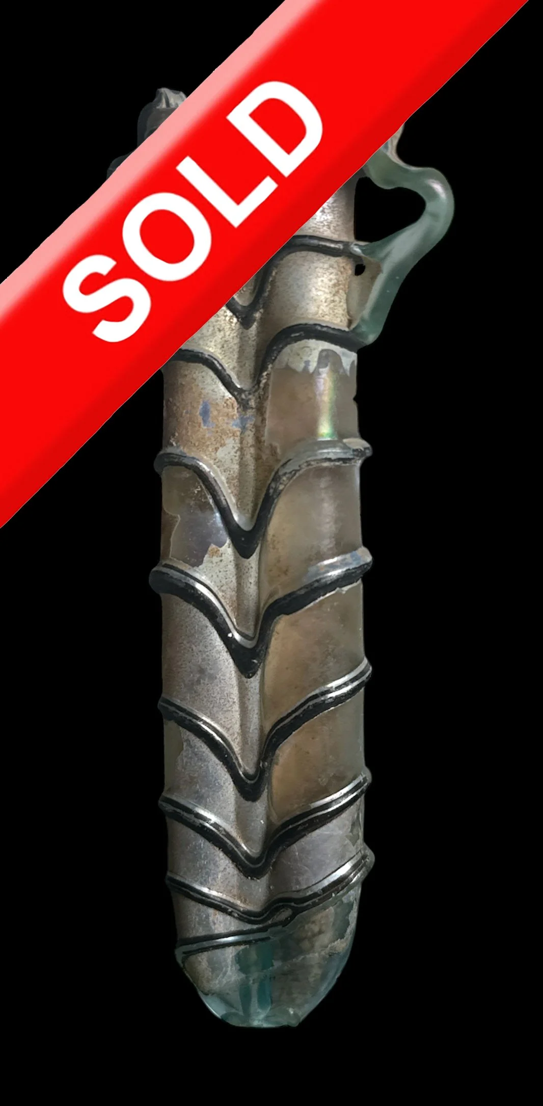 A metallic component with a segmented, bone-like structure against a black background, overlaid with a red banner that reads 'SOLD'.