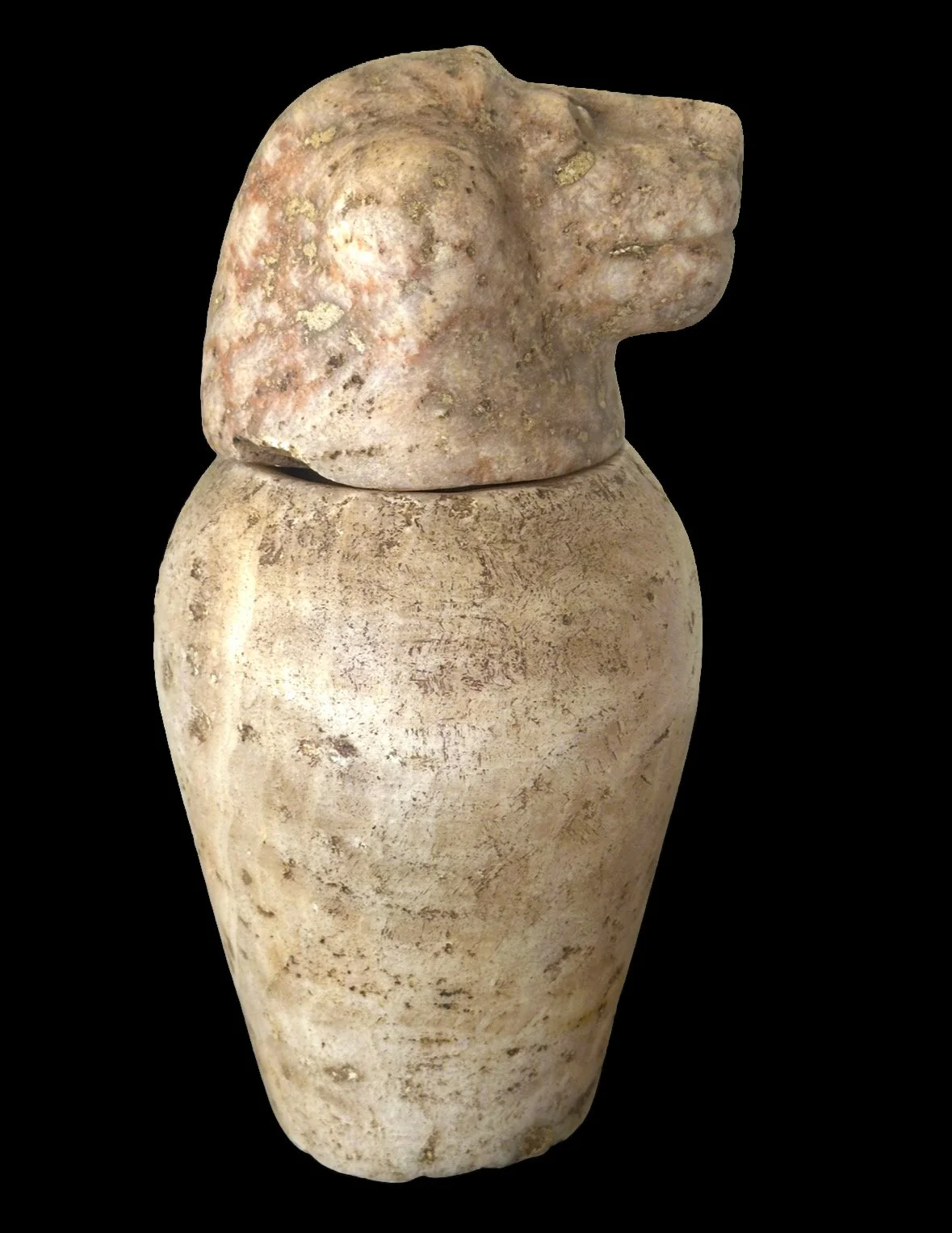An ancient fat-bodied ceramic vessel with a carved anthropomorphic head on top, set against a black background.