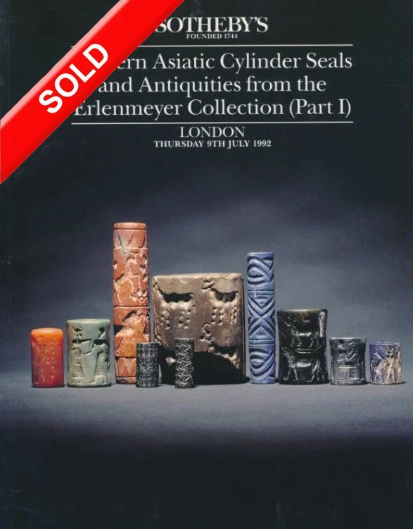 Auction catalog cover with title 'Eastern Asiatic Cylinder Seals and Antiquities from the Erlenmeyer Collection,' dated London, July 9th, 1992, featuring an arrangement of carved cylindrical seals in various sizes and colors on a dark background, marked with a red 'SOLD' banner.
