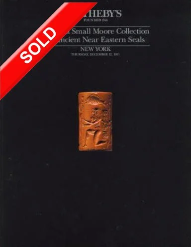 Sotheby's Auction catalog cover with a small, carved clay seal in the center and a red 'SOLD' banner in the top left corner.