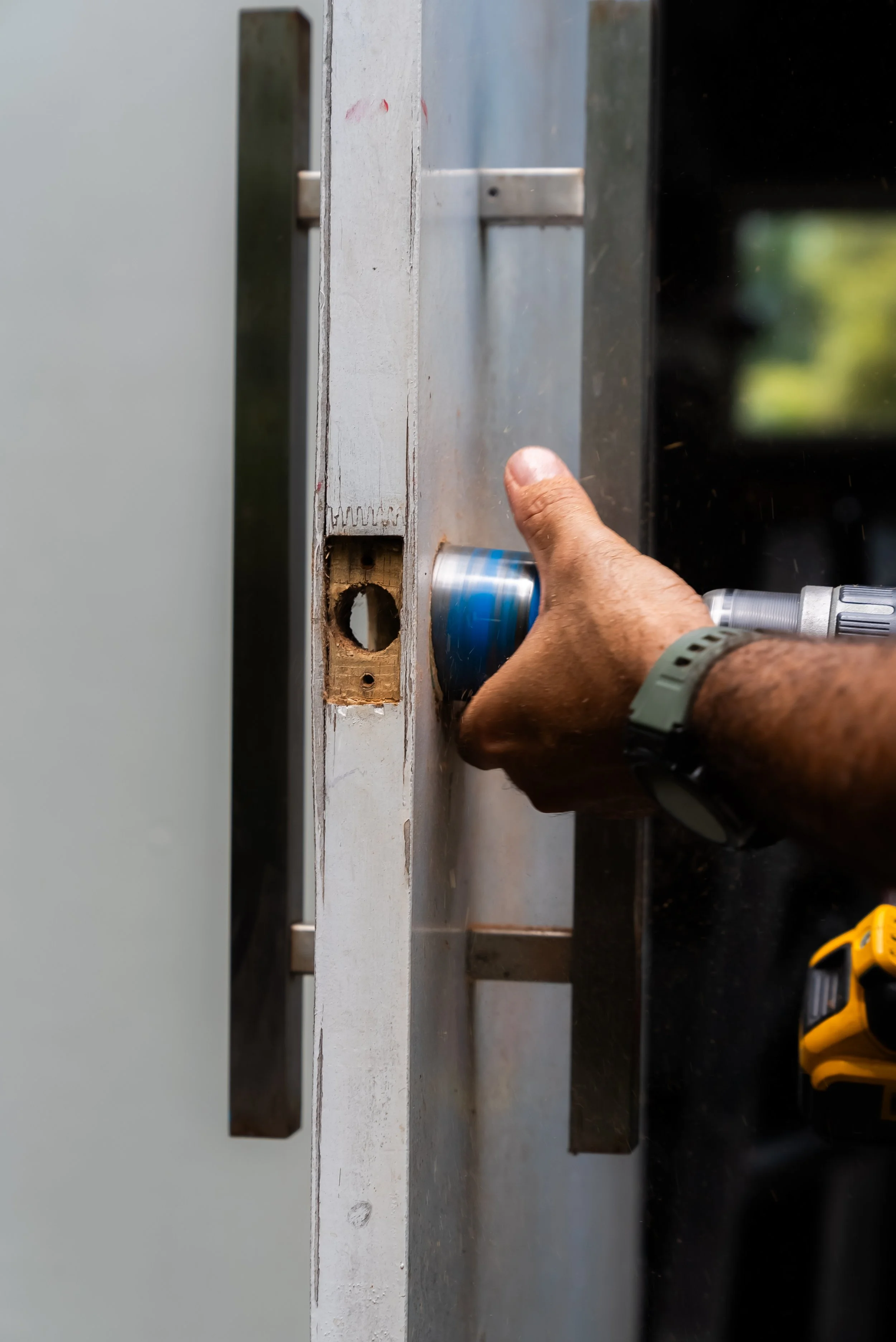 Marcoola Locksmith Tom Russo changes locks on a door in Marcoola. Experienced locksmith with over 20 years experience servicing the Sunshine Coast and South East Queensland