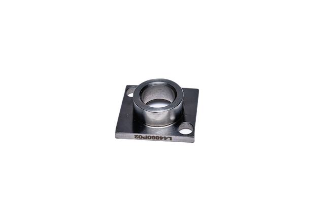 Metal flange bearing housing with mounting holes