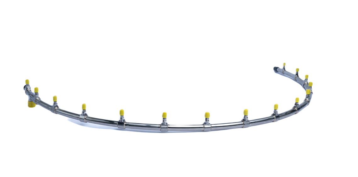 Metal circular nozzle manifold with multiple outlets and yellow caps