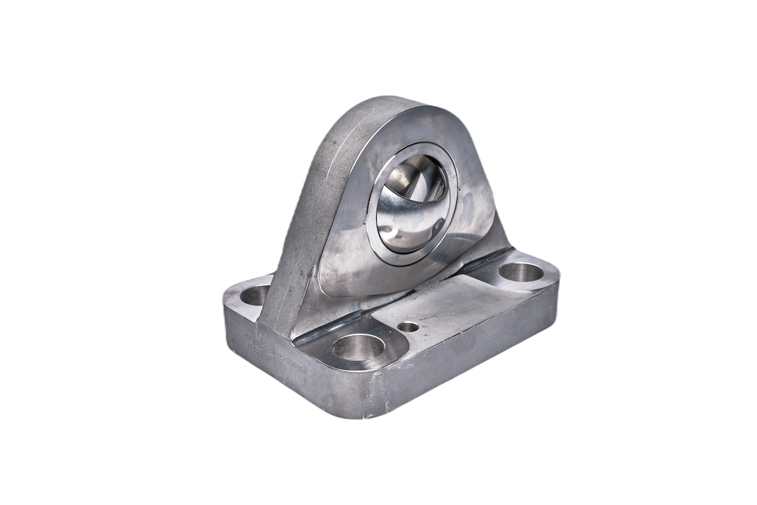Metal pillow block bearing on white background
