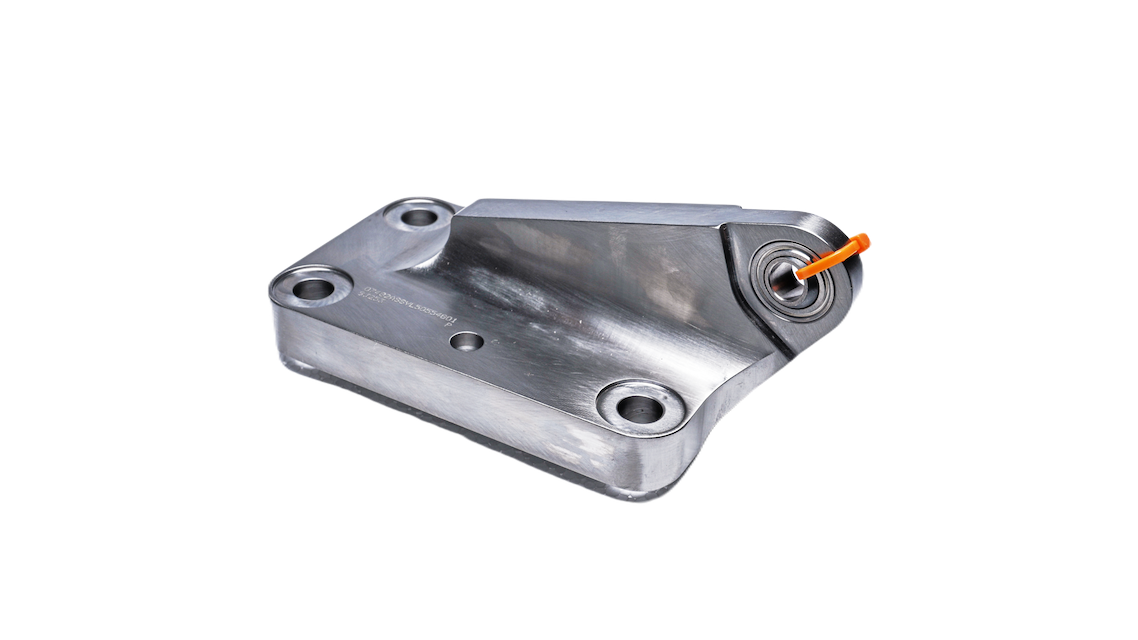 Metal bracket with four holes and an orange wire