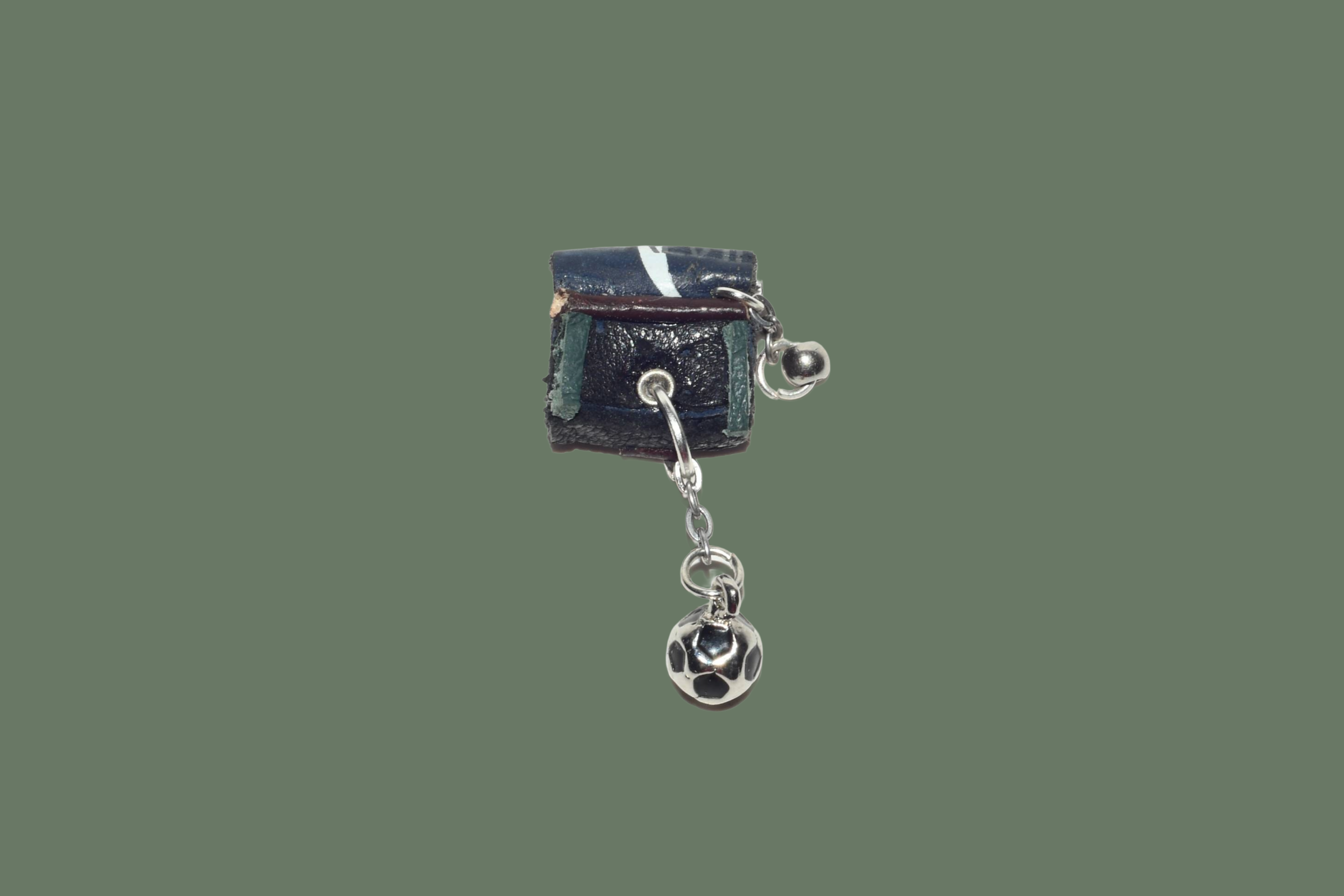 premium dark blue leather from calvin klein shoes.  silver football charm , silver chain
