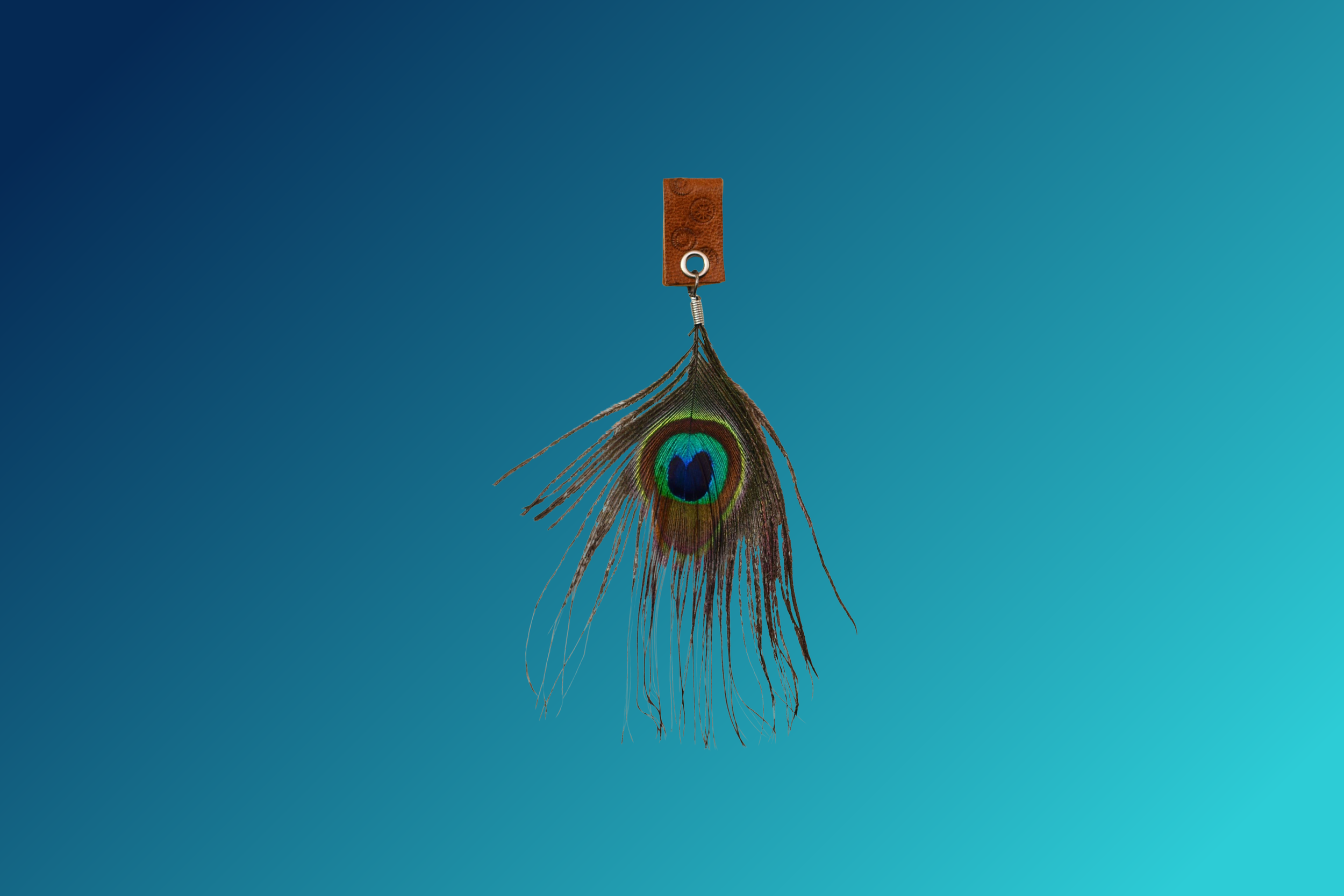 handmade slide on eyeglasses jewelry made of Natural peacock feather attached to organic leather holder  with Decorative stamps on.