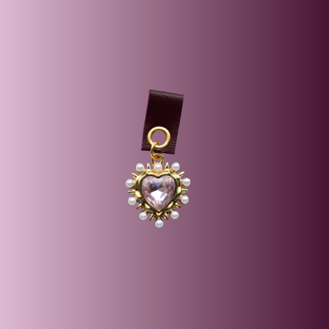 Baby Pink heart with pearls around attached with dark red leather holder