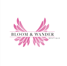 Logo of Bloom & Wander Boutique with stylized pink wings on a white background.