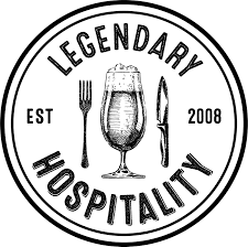 Circular logo with the text 'Legendary Hospitality' and 'Est 2008', featuring a fork, glass, and knife.